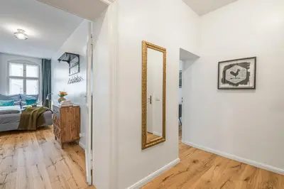 Ein Bett oder Betten in einem Zimmer der Unterkunft The Rheinsberger Mitte, 80m2, 2BR & Living Room, downtown location, Sleeps 6