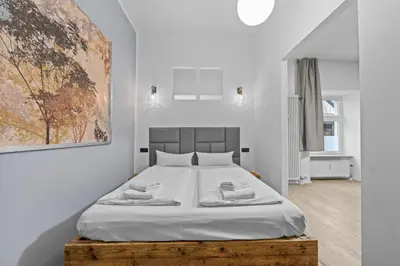 Ein Bett oder Betten in einem Zimmer der Unterkunft Apartment Uthman Berlin-Neukölln