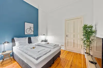 Ein Bett oder Betten in einem Zimmer der Unterkunft primeflats - Apartment Leberstr 58 Berlin Schöneberg