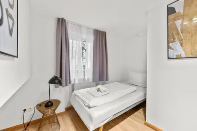 Ein Bett oder Betten in einem Zimmer der Unterkunft primeflats - Apartment Leberstr 58 Berlin Schöneberg
