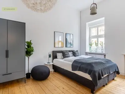 Ein Bett oder Betten in einem Zimmer der Unterkunft Apartments Berlin Niederbarnimstraße
