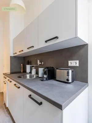 Küche/Küchenzeile in der Unterkunft Apartments Berlin Niederbarnimstraße