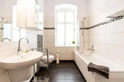 Ein Badezimmer in der Unterkunft FRITZ by ROCKCHAIR Apartments l SUPERHOST Status l 3 Bedrooms Boxspringbeds 2 Bathrooms 2 Kitchen - Cozy Family & Business Flair welcomes you!