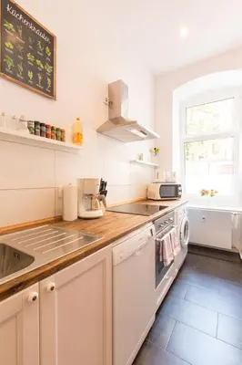Küche/Küchenzeile in der Unterkunft FRITZ by ROCKCHAIR Apartments l SUPERHOST Status l 3 Bedrooms Boxspringbeds 2 Bathrooms 2 Kitchen - Cozy Family & Business Flair welcomes you!