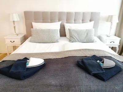 Ein Bett oder Betten in einem Zimmer der Unterkunft FRITZ by ROCKCHAIR Apartments l SUPERHOST Status l 3 Bedrooms Boxspringbeds 2 Bathrooms 2 Kitchen - Cozy Family & Business Flair welcomes you!