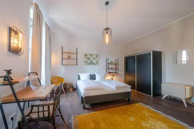 Ein Bett oder Betten in einem Zimmer der Unterkunft Design Apartments - 