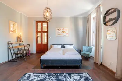 Ein Bett oder Betten in einem Zimmer der Unterkunft Design Apartments - 