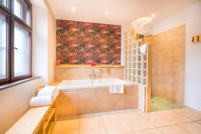 Ein Bett oder Betten in einem Zimmer der Unterkunft Design Apartments - 
