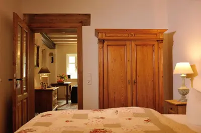 Ein Bett oder Betten in einem Zimmer der Unterkunft Hagemeisterensemble