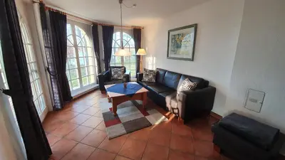 Ein Sitzbereich in der Unterkunft Villa Seeblick Bad Saarow