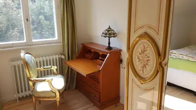 Ein Bett oder Betten in einem Zimmer der Unterkunft Ferienhaus Sanssouci