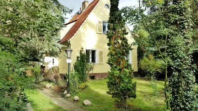 Ein Garten an der Unterkunft Ferienhaus Sanssouci
