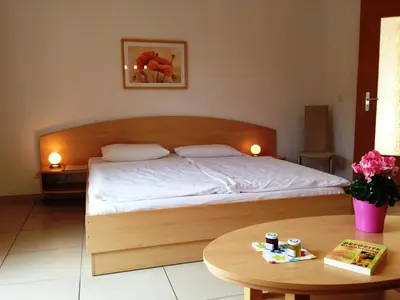 Ein Bett oder Betten in einem Zimmer der Unterkunft Apartment Am Lübbesee