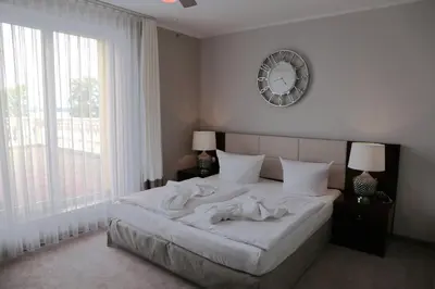 Ein Bett oder Betten in einem Zimmer der Unterkunft Hotel Resort Märkisches Meer