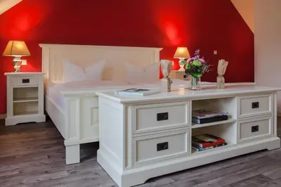 Ein Bett oder Betten in einem Zimmer der Unterkunft Pension am Werbellinkanal