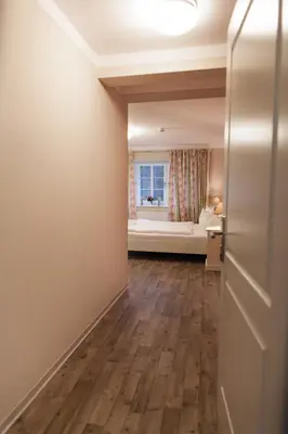 Ein Bett oder Betten in einem Zimmer der Unterkunft Pension am Werbellinkanal
