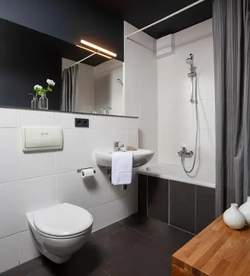 Ein Badezimmer in der Unterkunft Karlito Apartmenthaus