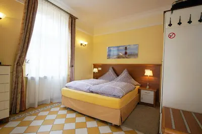Ein Bett oder Betten in einem Zimmer der Unterkunft Yacht- , und Reisemobilhafen 
