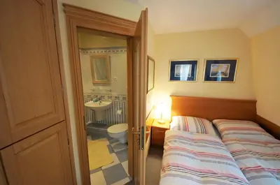 Ein Bett oder Betten in einem Zimmer der Unterkunft Yacht- , und Reisemobilhafen 