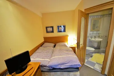 Ein Bett oder Betten in einem Zimmer der Unterkunft Yacht- , und Reisemobilhafen 