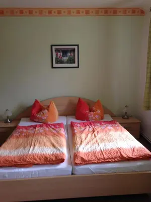 Ein Bett oder Betten in einem Zimmer der Unterkunft Landgasthaus am Dolgensee