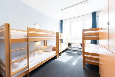 Ein Bett oder Betten in einem Zimmer der Unterkunft Industriepalast Berlin