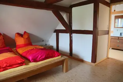 Ein Bett oder Betten in einem Zimmer der Unterkunft Ferienwohnung am Hohennauener See