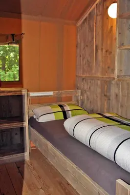 Ein Bett oder Betten in einem Zimmer der Unterkunft Safarizelte