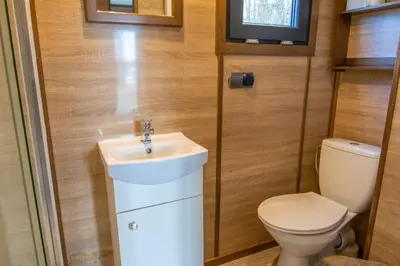 Ein Badezimmer in der Unterkunft Mobilheime am See