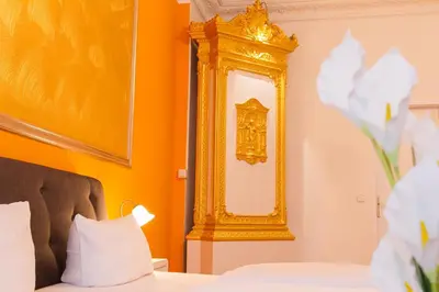 Ein Bett oder Betten in einem Zimmer der Unterkunft Hotel Spreewitz am Kurfürstendamm