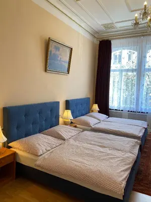 Ein Bett oder Betten in einem Zimmer der Unterkunft Hotel Gunia