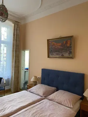 Ein Bett oder Betten in einem Zimmer der Unterkunft Hotel Gunia