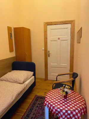 Ein Bett oder Betten in einem Zimmer der Unterkunft Hotel Gunia