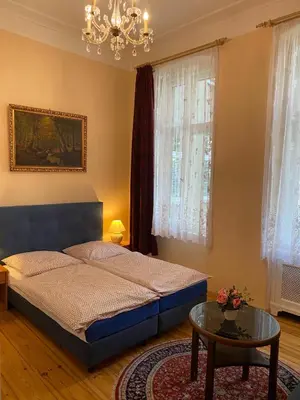 Ein Bett oder Betten in einem Zimmer der Unterkunft Hotel Gunia