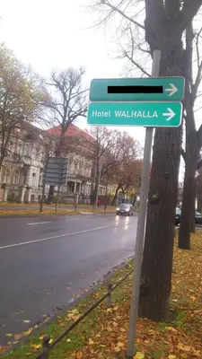 Ein Zertifikat, Auszeichnung, Logo oder anderes Dokument, das in der Unterkunft Aparthotel Walhalla Potsdam ausgestellt ist