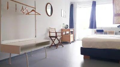 Ein Bett oder Betten in einem Zimmer der Unterkunft Minitel