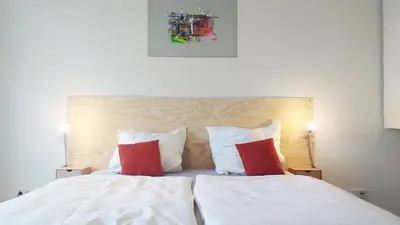 Ein Bett oder Betten in einem Zimmer der Unterkunft Minitel