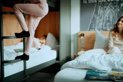 Ein Bett oder Betten in einem Zimmer der Unterkunft MEININGER Hotel Berlin Hauptbahnhof