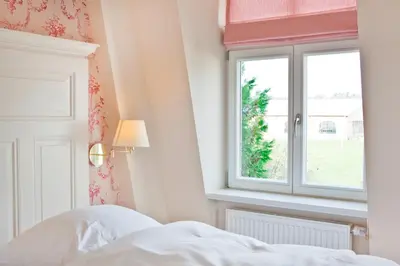 Ein Bett oder Betten in einem Zimmer der Unterkunft Gut Sarnow - Hotel und Restaurant