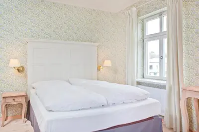 Ein Bett oder Betten in einem Zimmer der Unterkunft Gut Sarnow - Hotel und Restaurant
