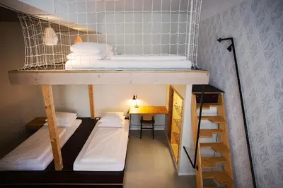 Ein Bett oder Betten in einem Zimmer der Unterkunft Michelberger Hotel