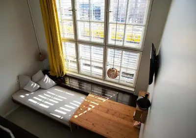 Ein Bett oder Betten in einem Zimmer der Unterkunft Michelberger Hotel