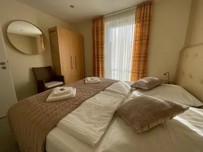 Ein Bett oder Betten in einem Zimmer der Unterkunft Lakeview Appartements