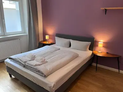Ein Bett oder Betten in einem Zimmer der Unterkunft RiSo Apartment 2