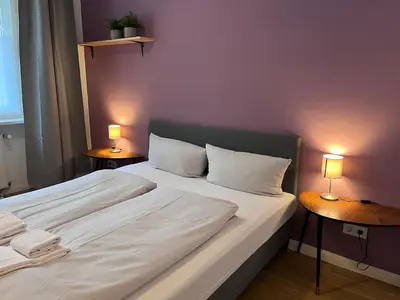 Ein Bett oder Betten in einem Zimmer der Unterkunft RiSo Apartment 2
