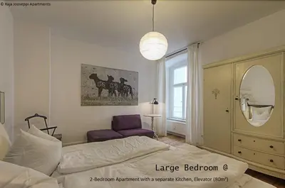 Ein Bett oder Betten in einem Zimmer der Unterkunft Raja Jooseppi Apartments