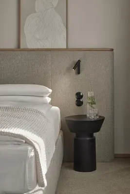Ein Bett oder Betten in einem Zimmer der Unterkunft ADELANTE Boutique Hotel