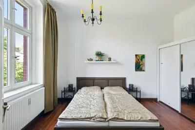 Ein Bett oder Betten in einem Zimmer der Unterkunft Gründerzeitvilla in Potsdam