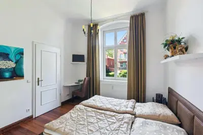 Ein Bett oder Betten in einem Zimmer der Unterkunft Gründerzeitvilla in Potsdam