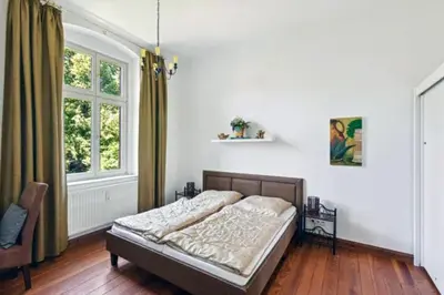 Ein Bett oder Betten in einem Zimmer der Unterkunft Gründerzeitvilla in Potsdam